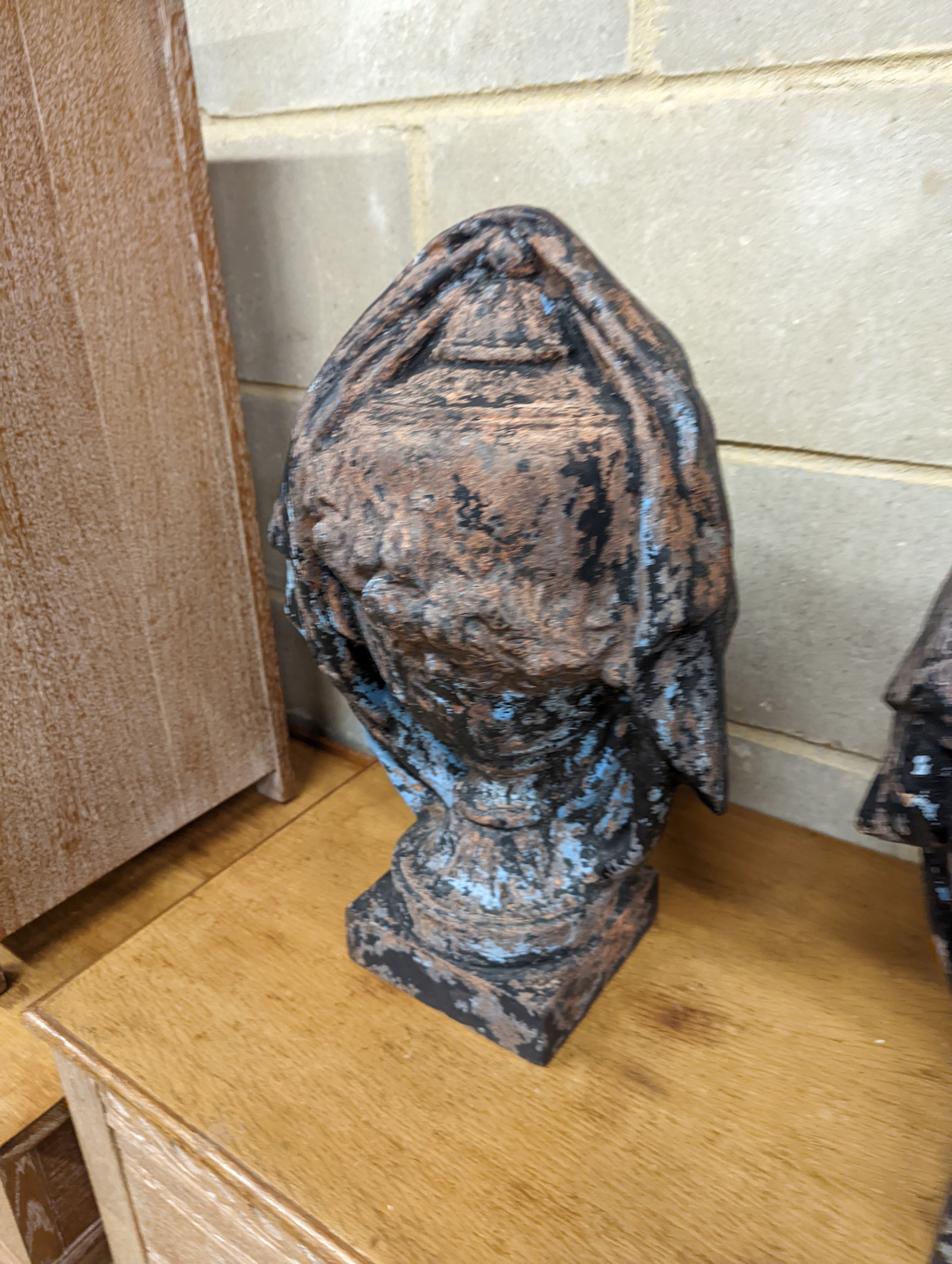 A pair of cast iron urn shaped finials. H-48cm.
